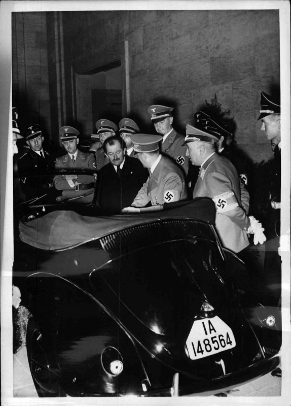 Ferdinand Porsche presents a convertible beetle to Adolf Hitler for his birthday